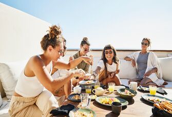 Group of friends eating.
