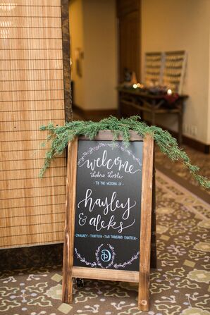 Rustic Wood Sign with Calligraphy and Pine Leaves