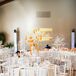 Cascading Orange Flower, White Tree Centerpieces