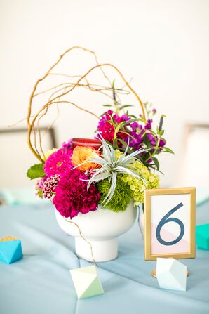 Gold Framed Table Number with Geode Decor and Bright Arrangement of Wildflowers