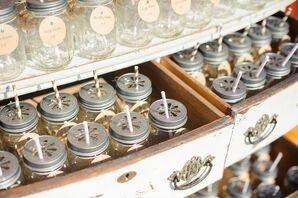 Mason Jar Escort Cards and Favors in Antique Dresser