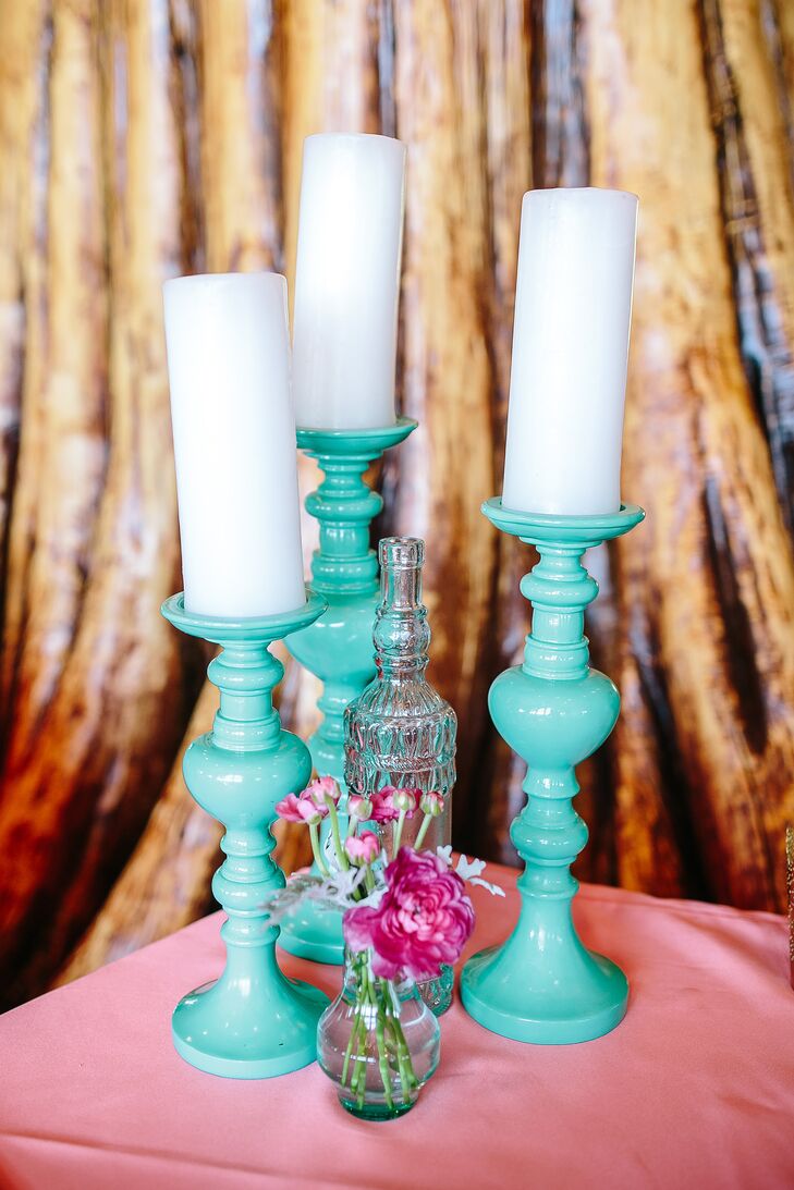 The color palette was gold, accented with turquoise and pink. All of the decor was specifically created for Caitlin and Eric's big day.