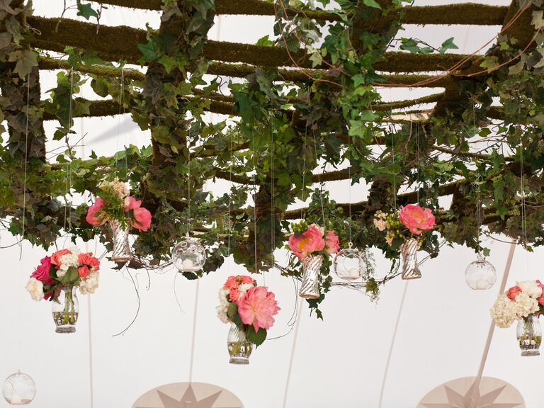 Suspended trellis decor with ivy and hanging bud vases