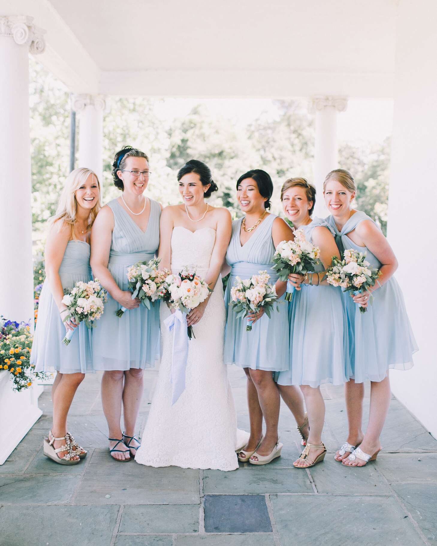 Bridesmaids in Knee Length Powder Blue Dresses at Summer Wedding