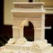 Judy at Simon Lee Bakery helped the couple design their wedding cake to look like the arch at Washington Square Park in New York City where Cole proposed to Emy. "It was so unique and personal for us. The details were amazing, and the cake tasted even better!" says Emy. There were several flavors from guests to choose from: chocolate with chocolate icing, vanilla with fresh strawberries and cream and strawberry with strawberry icing.