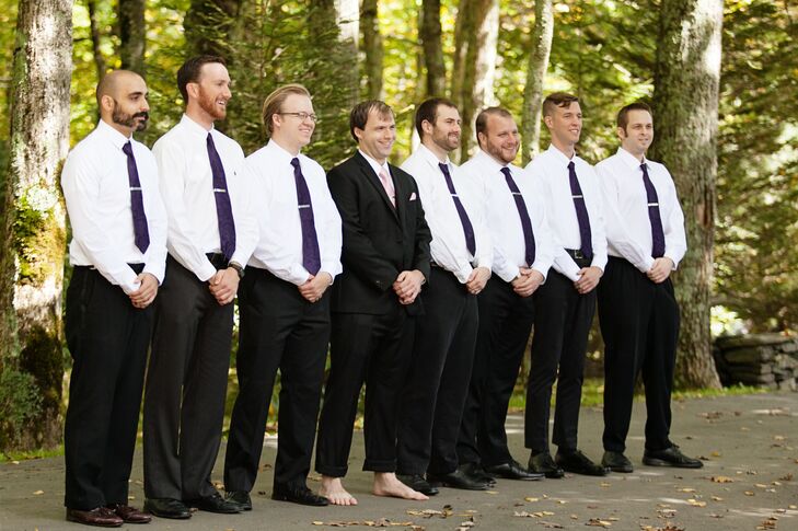 Groom in Black Suit Without Shoes
