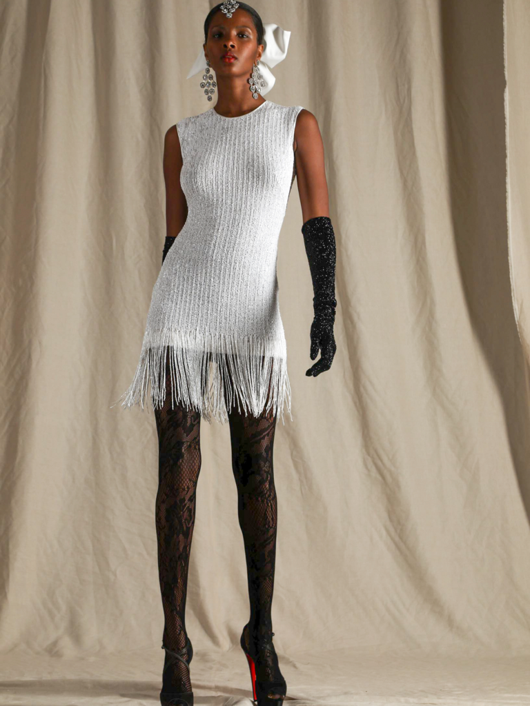 Mini flapper-style white dress by Naeem Khan. 