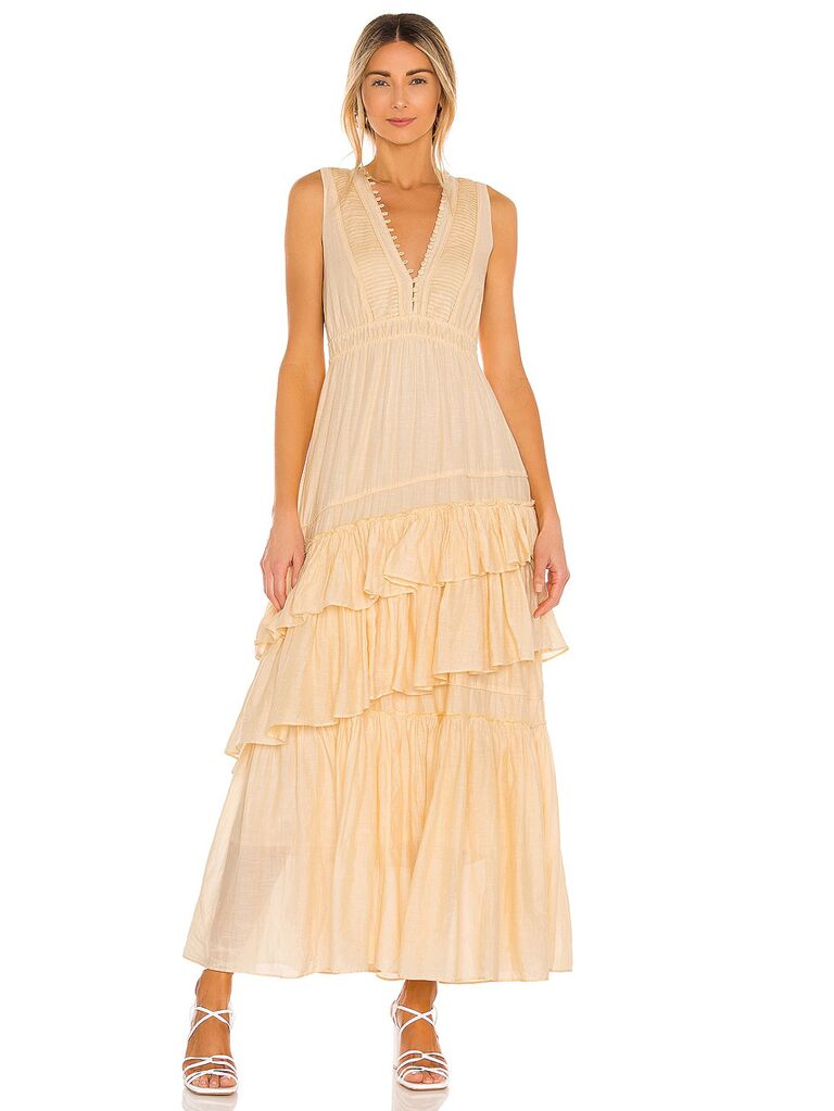 revolve pale yellow pastel dress for wedding guests with v-neckline and ruffle layered skirt
