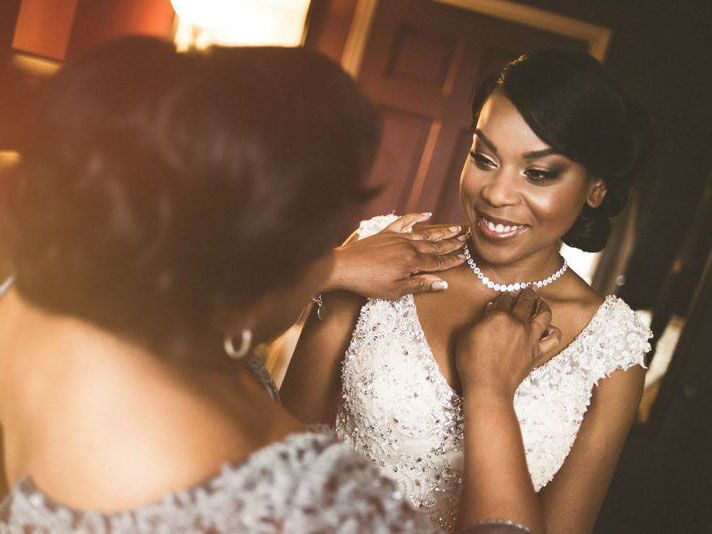 Bride getting ready with her mother