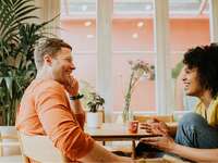 Couple on a date in coffee shop