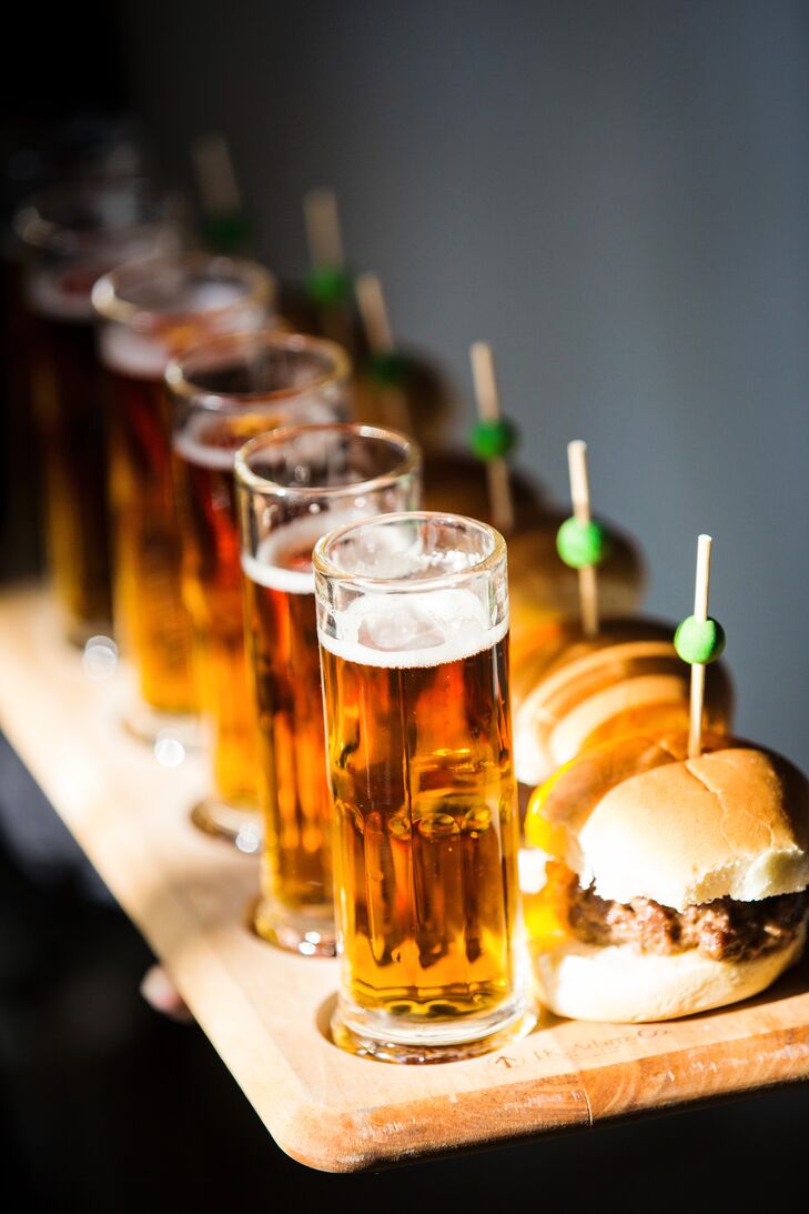 At the cocktail hour, Molly and Boston served mini Juicy Lucy Burgers, a Minnesota staple, along with mini beers, french fries and soft pretzels. They wanted it to feel like a bar, so they completely transformed their venue, Aria in Minneapolis, Minnesota.