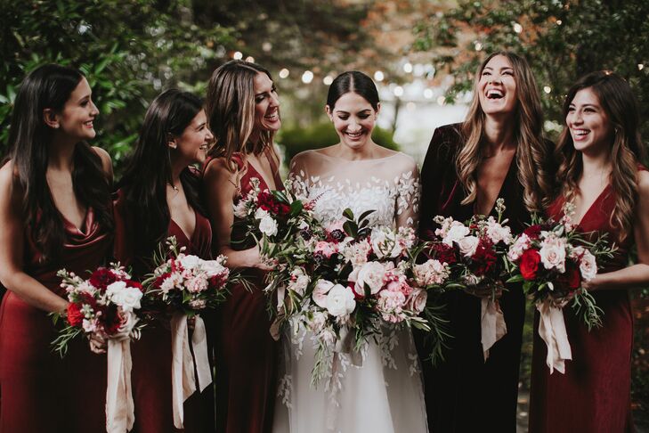 Bridesmaids with Burgundy Dresses and Romantic Bouquets with Pink Ribbon