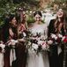 Bridesmaids with Burgundy Dresses and Romantic Bouquets with Pink Ribbon