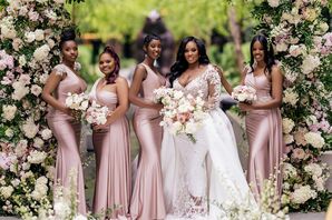 Bride in Illusion Dress With Overskirt and Bridesmaids in Satin Pink Dresses