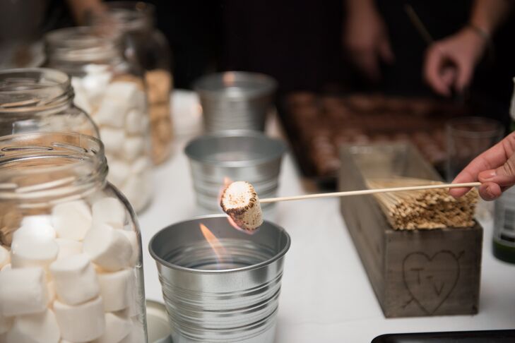 Vicki and Tim opted out of having a cake to make more room for the delicious s'mores dessert bar that had a variety of chocolate with marshmallows and graham crackers.