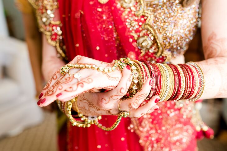 Bride in Red Sari with Indian Bengals and Henna