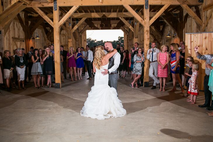 Lauren and Drake took their first dance as husband and wife inside the barn at Amador Cellars in Plymouth, California, where friends and family gathered around to enjoy the moment between the newlyweds.
