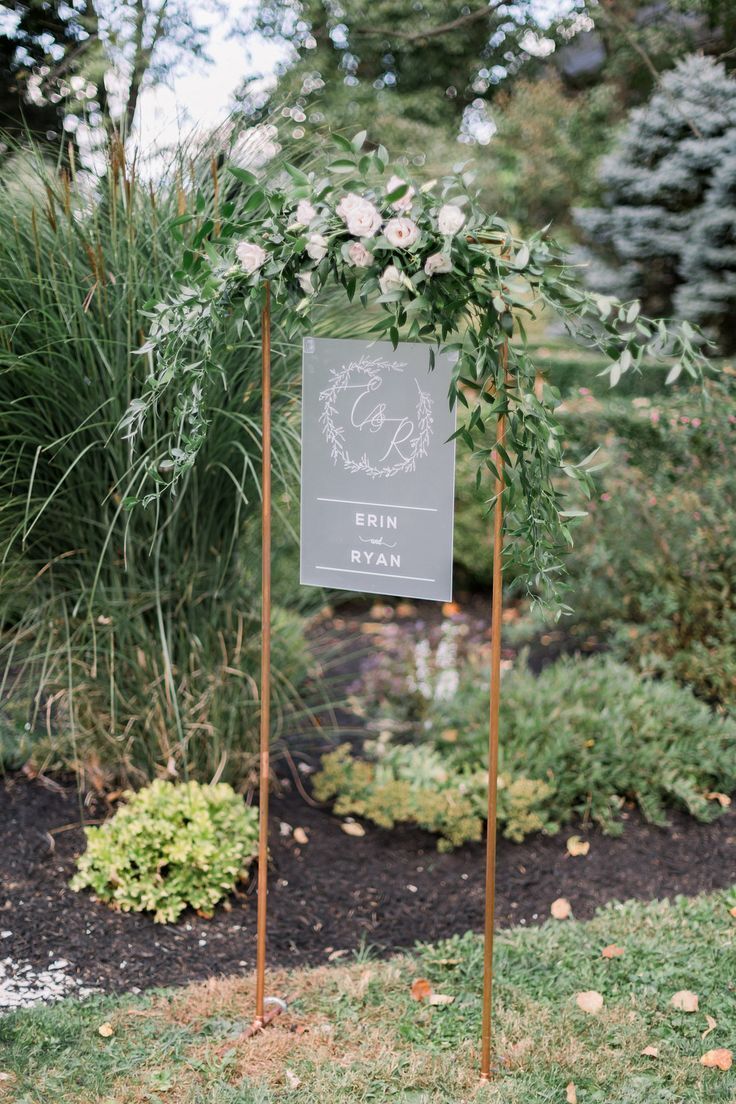 Simple gray sign with monogram and greenery