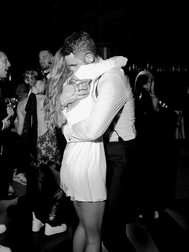 Kate and her husband embrace on the dance floor. 