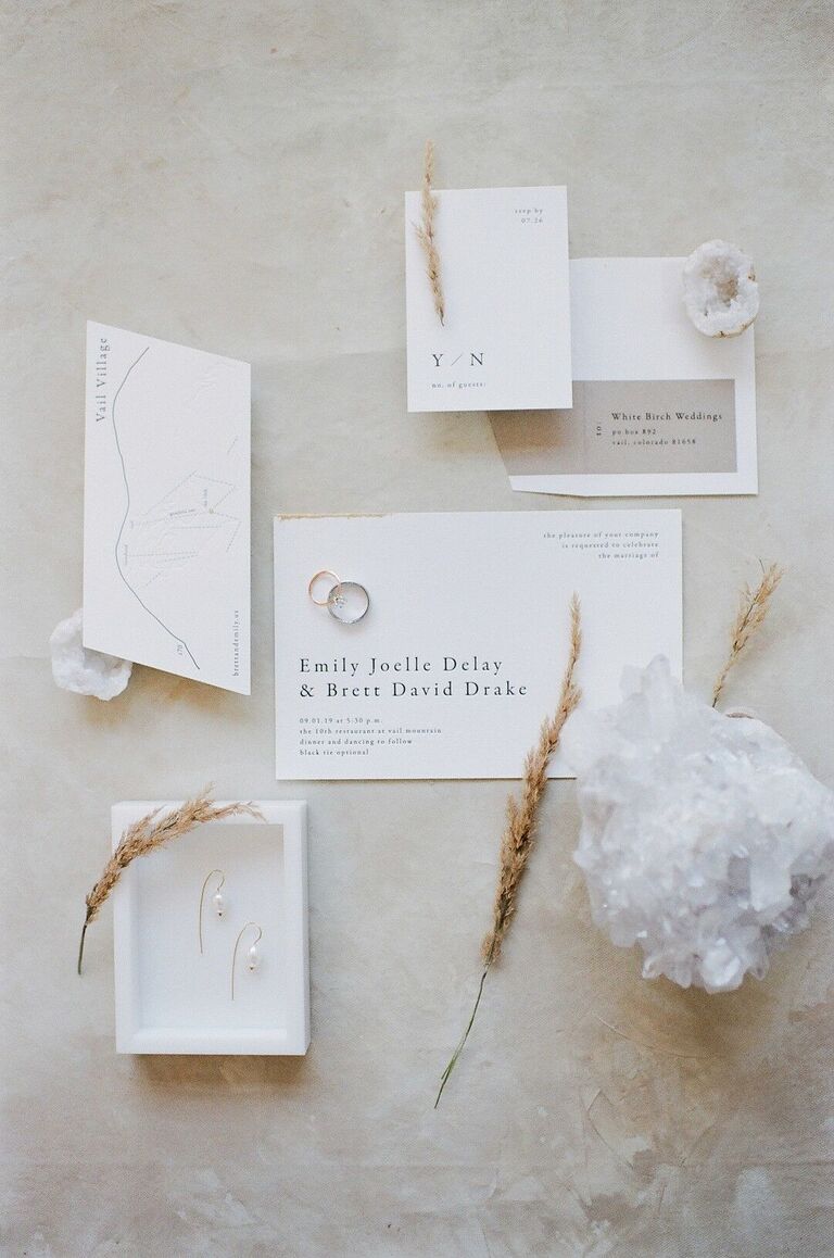 Modern and minimalist white wedding invitation suite 