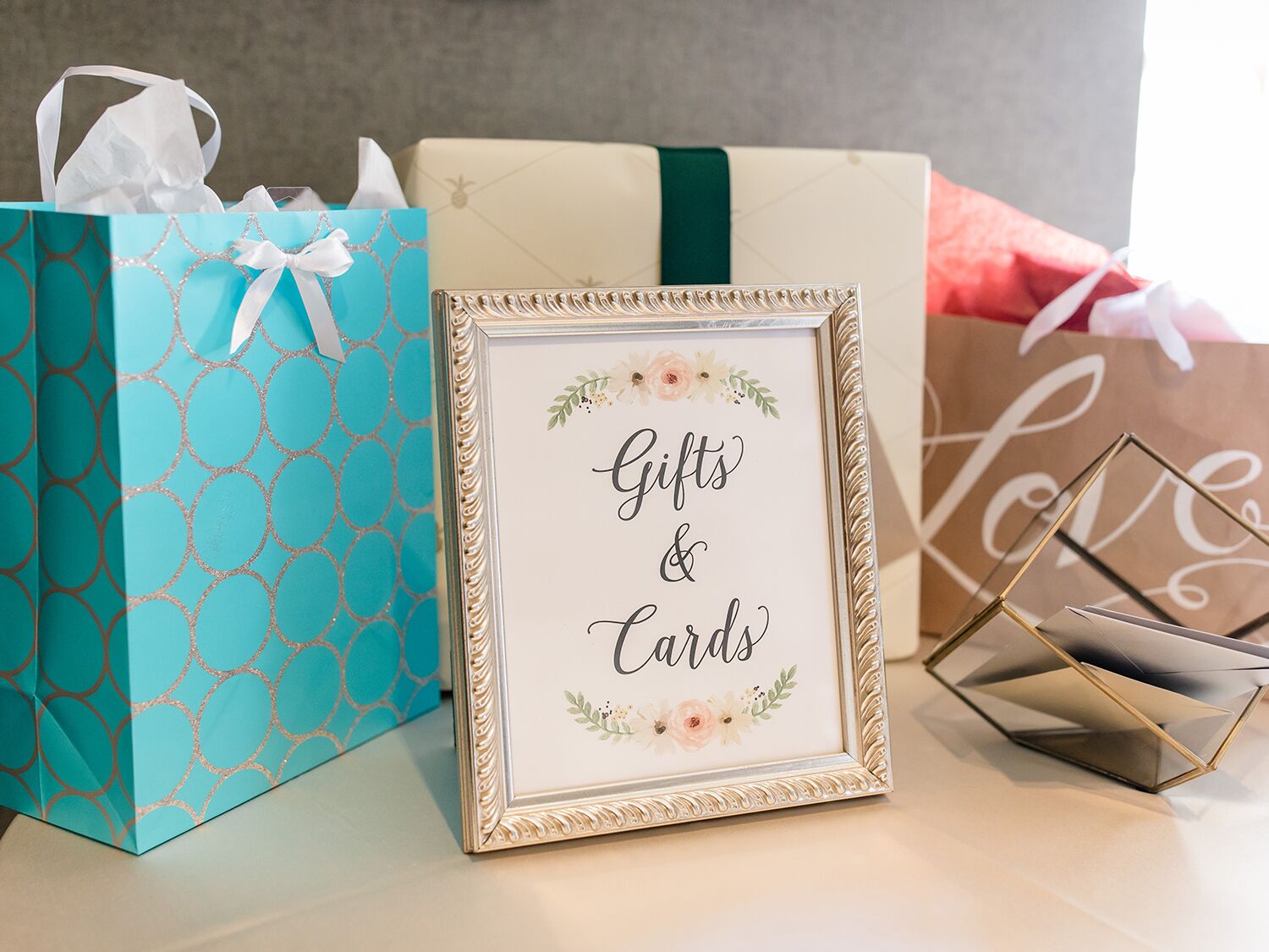wedding gift table with sign that reads gifts and cards