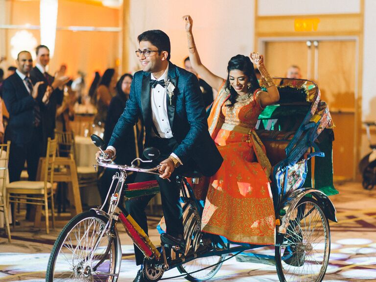 Couple reception entrance at Indian wedding
