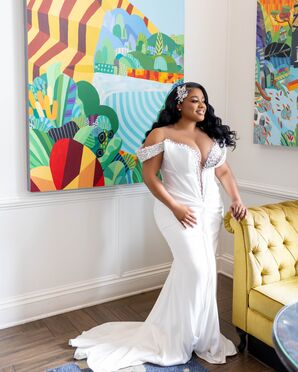 Bride in Sleek-and-Bejeweled Fitted Wedding Gown With Crystal Hairpiece and Matte Makeup Look