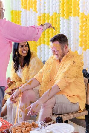 Bride and Groom at Pre-Wedding Haldi Ceremony With Turmetic