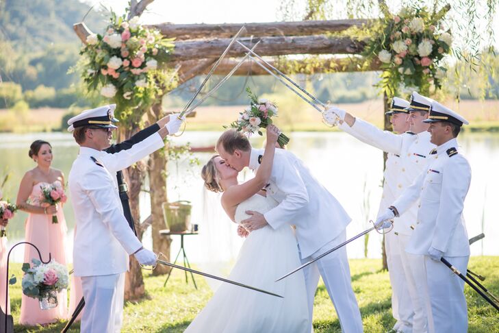 After their marriage pronouncement and during their first kiss, Park’s fellow Navy officers gave the newlyweds a sword salute. “We had six military officers perform the arch, and it was definitely one of our favorite moments from the ceremony,” Morgan says. The couple walked down the aisle to Vitamin String Quartet’s version of "Concerning Hobbits," a nod to their love for “The Lord of the Rings.”