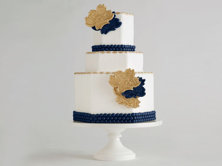 Hexagonal shaped wedding cake with navy trim