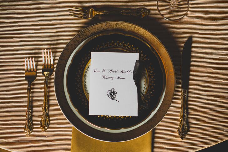Place settings at the reception were set with vintage china that Shayne has been collecting for years. Shayne and Brad also provided their guests with a "kissing menu," which contained instructions on how to solicit a kiss from the bride and groom.