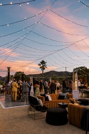 String Lights Over Reception Dance Floor at Sunset