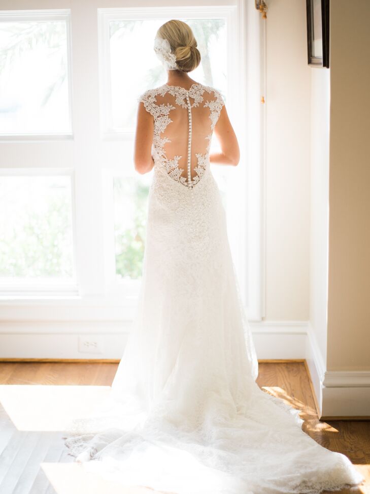 "I went with a dress that was more simple in style but still had the fine details: ivory with beautiful lace. It was fitted, but I could still move around and enjoy myself in it," Nicole says.