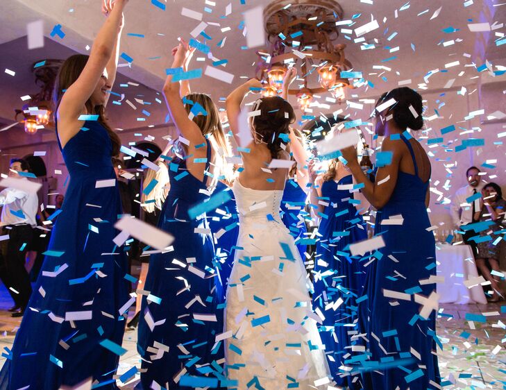 One of the groomsmen surprised the couple by bringing along his famous confetti gun, which took the dance party to a new level. “All the guests had a great time taking turns shooting off the confetti and dancing around in the streams,” Amy says.