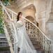 Continuing with the idea of romantic European villa setting, Amy’s wedding dress had a sheer long train, which she paired with an elegant cathedral veil.