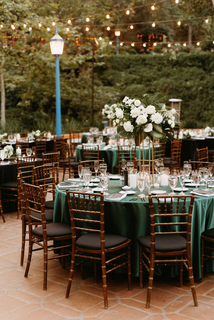 Round Tables With Emerald Green Linens, Tall Centerpieces With White Flowers at Black Tie Reception