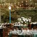 Round Tables With Emerald Green Linens, Tall Centerpieces With White Flowers at Black Tie Reception
