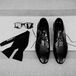 AJ wore a black tux—fitting with the old-Hollywood, black-tie vibe—paired with patent leather shoes.