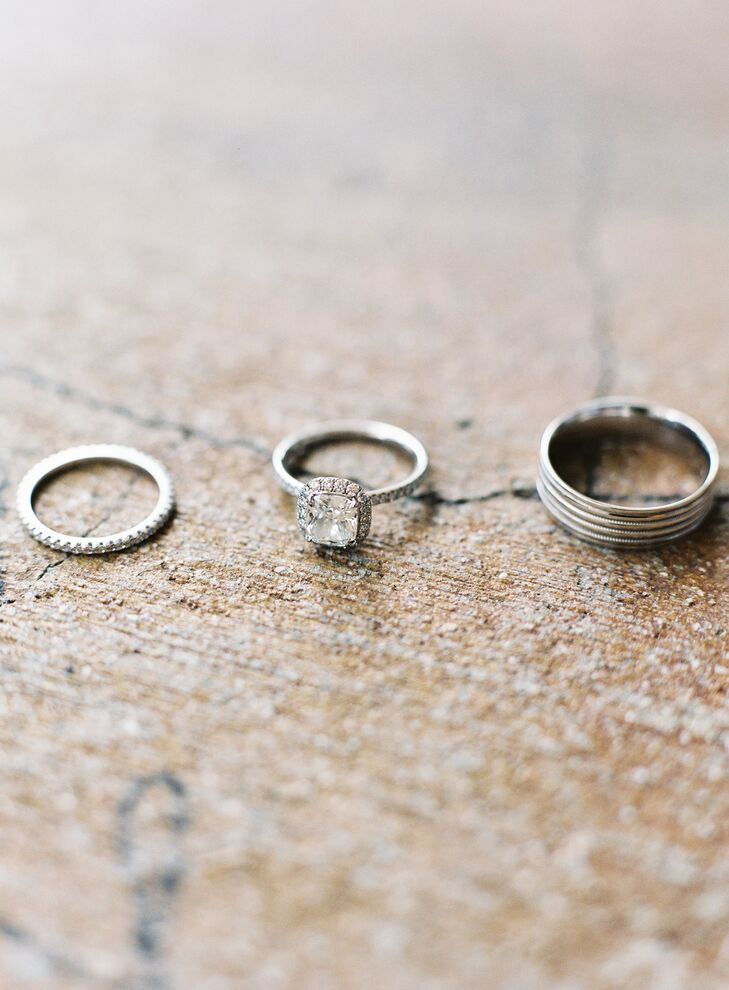 “When I was younger, I was convinced that the higher the quality, the greater the sparkle, and even that could outshine something twice its size. As I matured, my reasoning became more sentimental. I wanted the ring to represent the purity of marriage and our love as something timeless,” says Joyce. Jae chose a timeless princess cut diamond engagement ring with a diamond halo from Harry Winston for Joyce. The couple bought their wedding bands from a private independent jeweler.