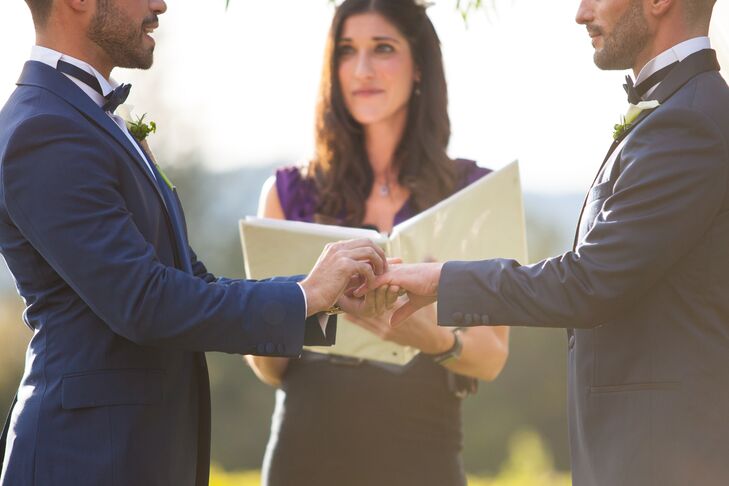 Renato and Patrick exchanged vows under a leafy arbor on the front lawn of Chateau St. Jean Winery in Kenwood, California.