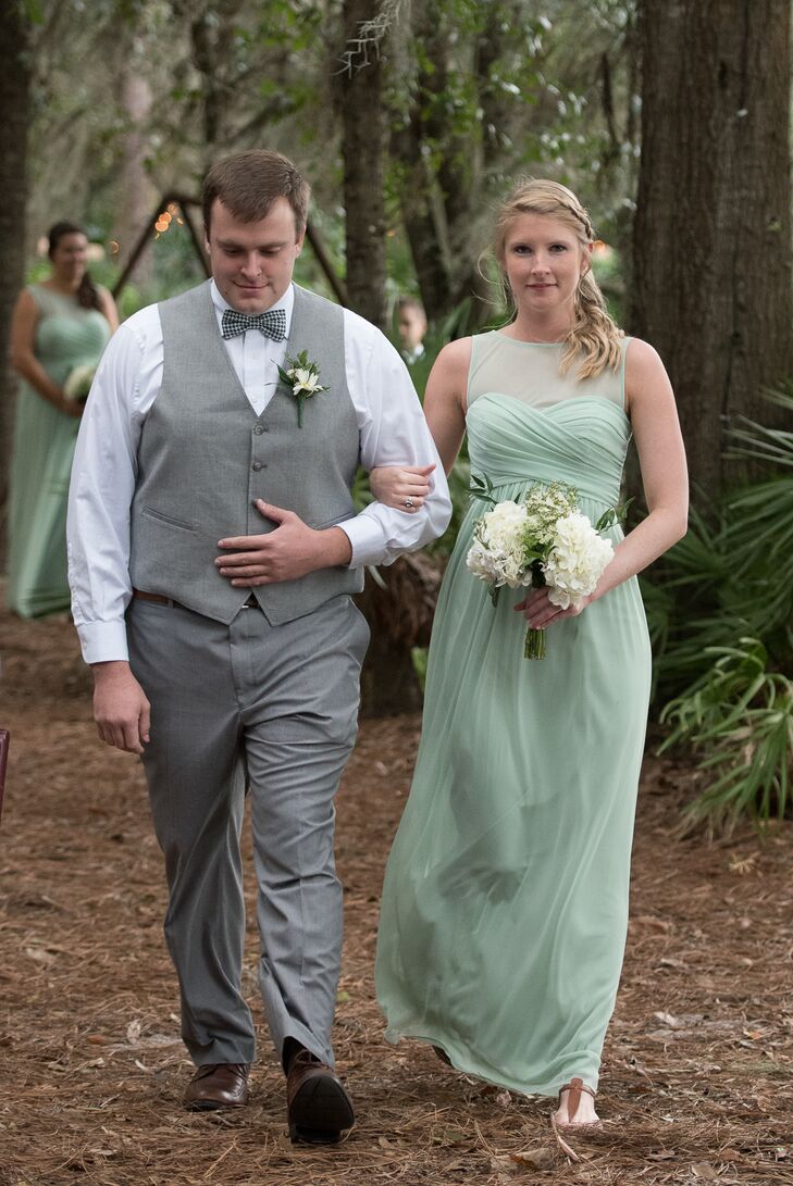 The bridesmaids wore mint green long dresses with an illusion neckline, from David's Bridal.
