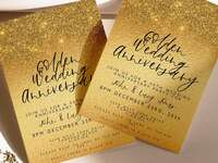 Glittery gold 50th anniversary invitations