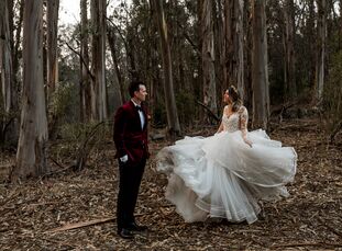 For their rustic wedding, Kaycee	Young and Martin Rydder aimed for a "dramatic forest feel with a bit of a boho vibe." Their venue's location among to