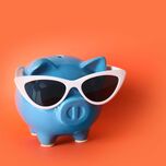 Piggy bank with sunglasses