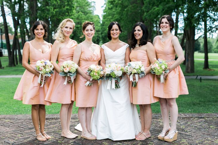 Noel wanted her bridesmaids to feel beautiful and comfortable, so in addition to giving them free rein over their accessories, makeup and hairstyles, she had them work with the consultants at Anna Elyse Collections to find a dress style that would work best for their body types. “We had one bridesmaid who also took her dress and had it customized into a design she loved,” Noel says. “The only thing I asked was for them to wear either flats or wedges to make the walk down the aisle easier.”