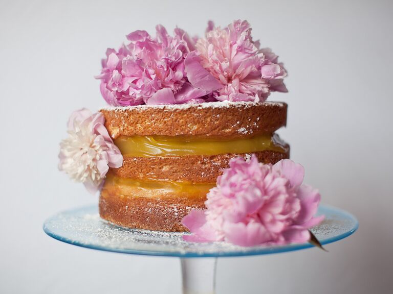 Naked bridal shower cake with pink fresh flowers