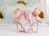 Blush pink wedding heels with pink bows