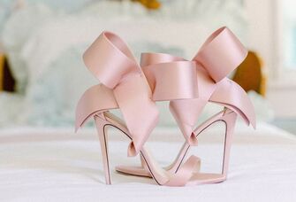 Blush pink wedding heels with pink bows