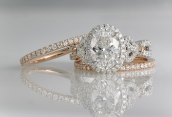 yellow gold and platinum engagement ring and wedding bands
