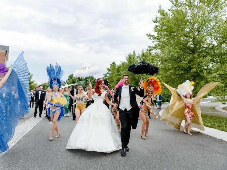 Colorful second line after a couple's wedding ceremony. 